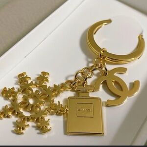 CHANEL Gold-Tone Perfume Bottle, CC Logo & Snowflake Key Charm